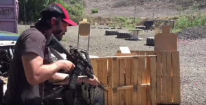 keanu-reeves-shredding-on-tactical-gun-range-assault-rifle
