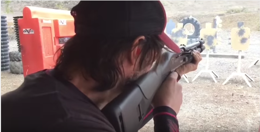 keanu-reeves-shredding-on-tactical-gun-range