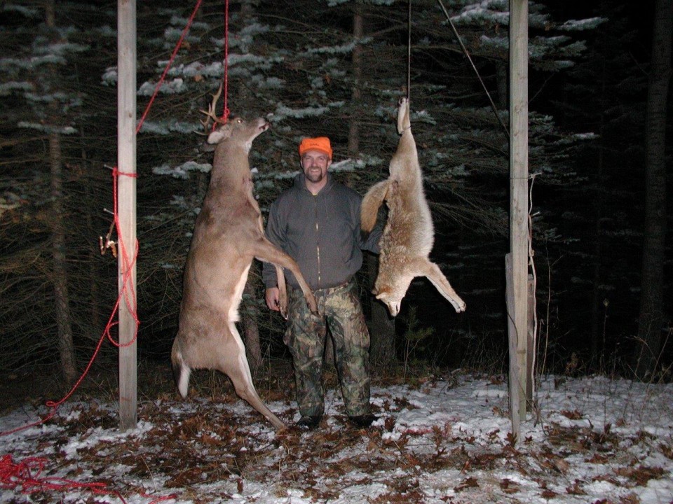 todd-taylor-with-deer-and-coyote