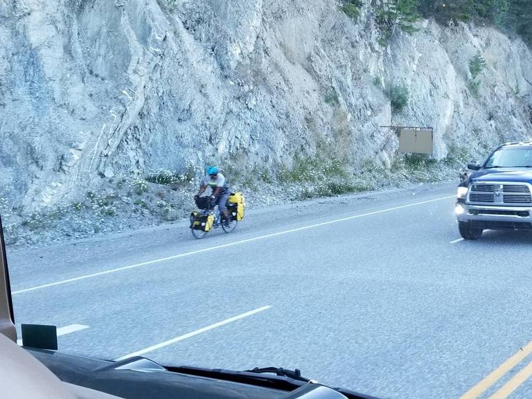 cyclist-with-bear-in-pursuit