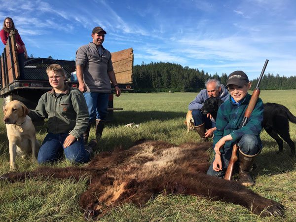 elliot-clark-and-family-with-the-hide-from-attacking-brown-bear